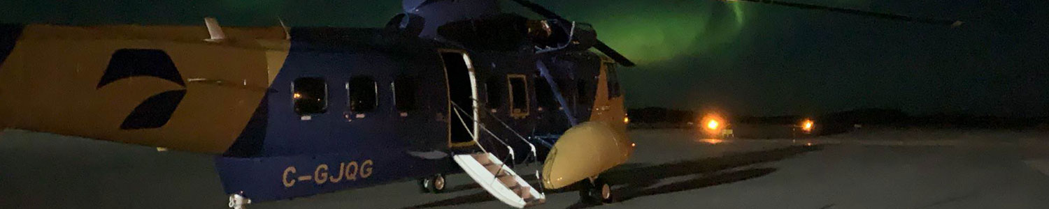 CBO_News-Header-CBO-a-hidden-gem-for-career-opportunities An S-61 helicopter on an airstrip in Iqaluit, Nunavut, after flying in CBO staff to the Zone 4 North Warning System radar sites