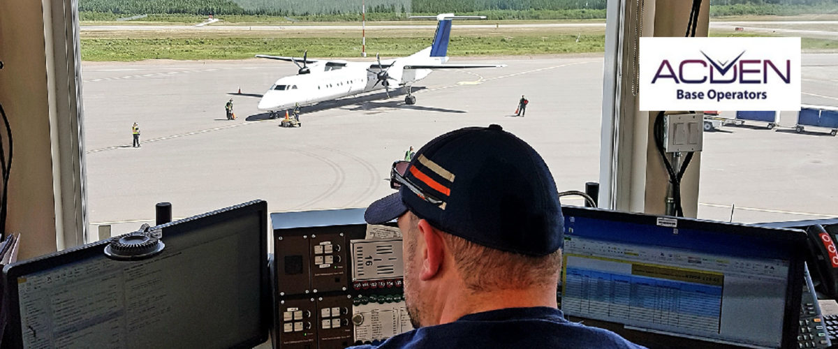 A CBO/ABO employee in an air traffic control tower looking at Suncor Firebag Aerodrome in Alberta.