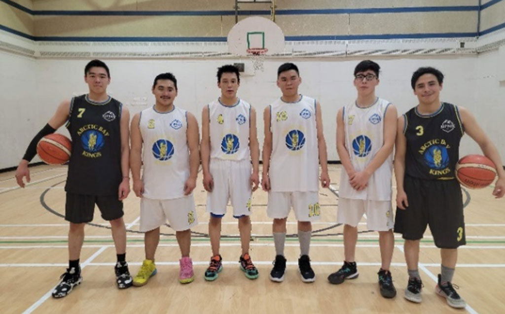 six male basketball players